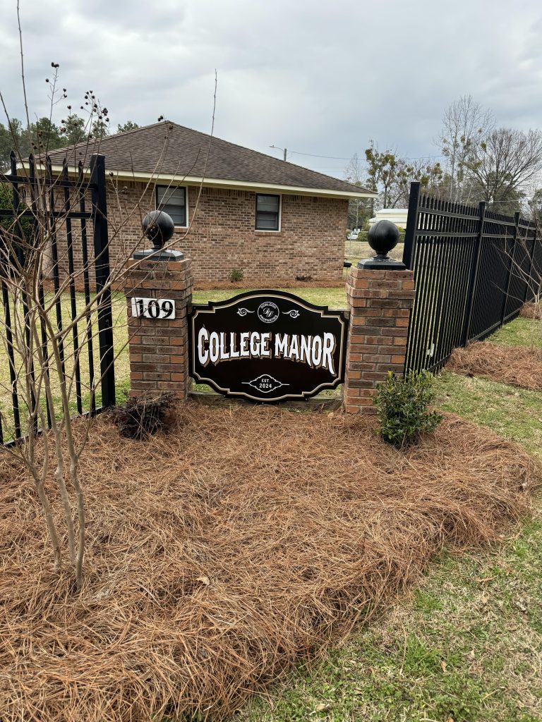 photo of the sign at Newly Renovated College Manor